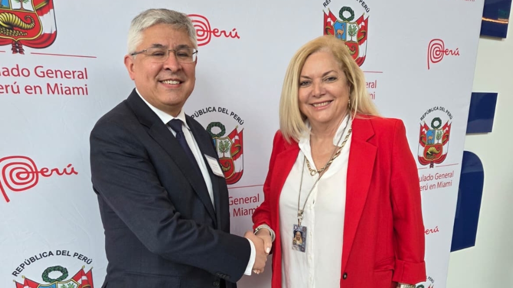 Supervisor of Elections Alina Garcia with Peru Consul General David Vergara Pilares.
