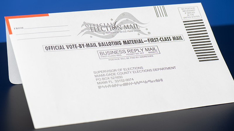 A vote-by-mail envelope.